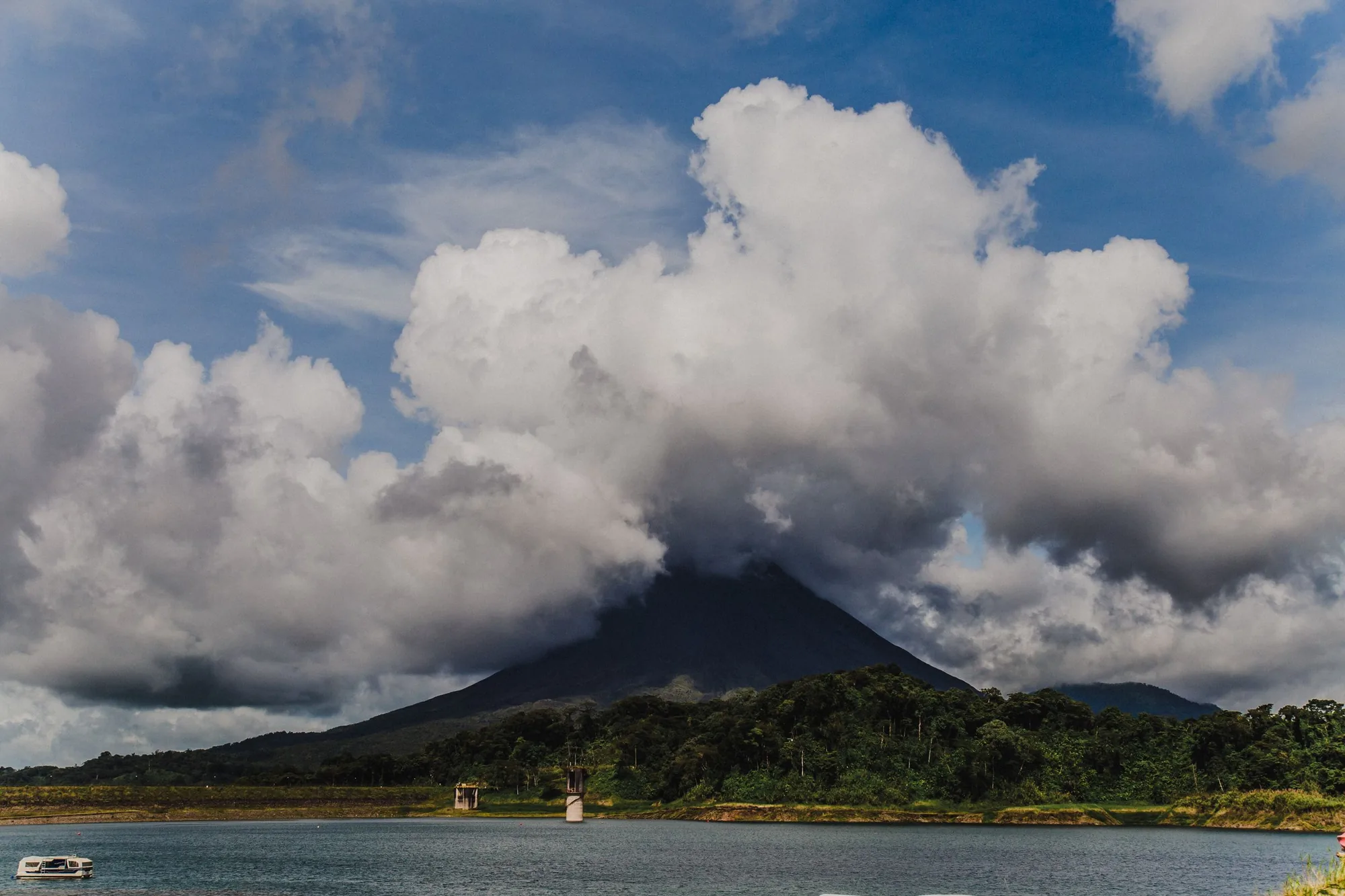 Cloud wrapping the summit above the water