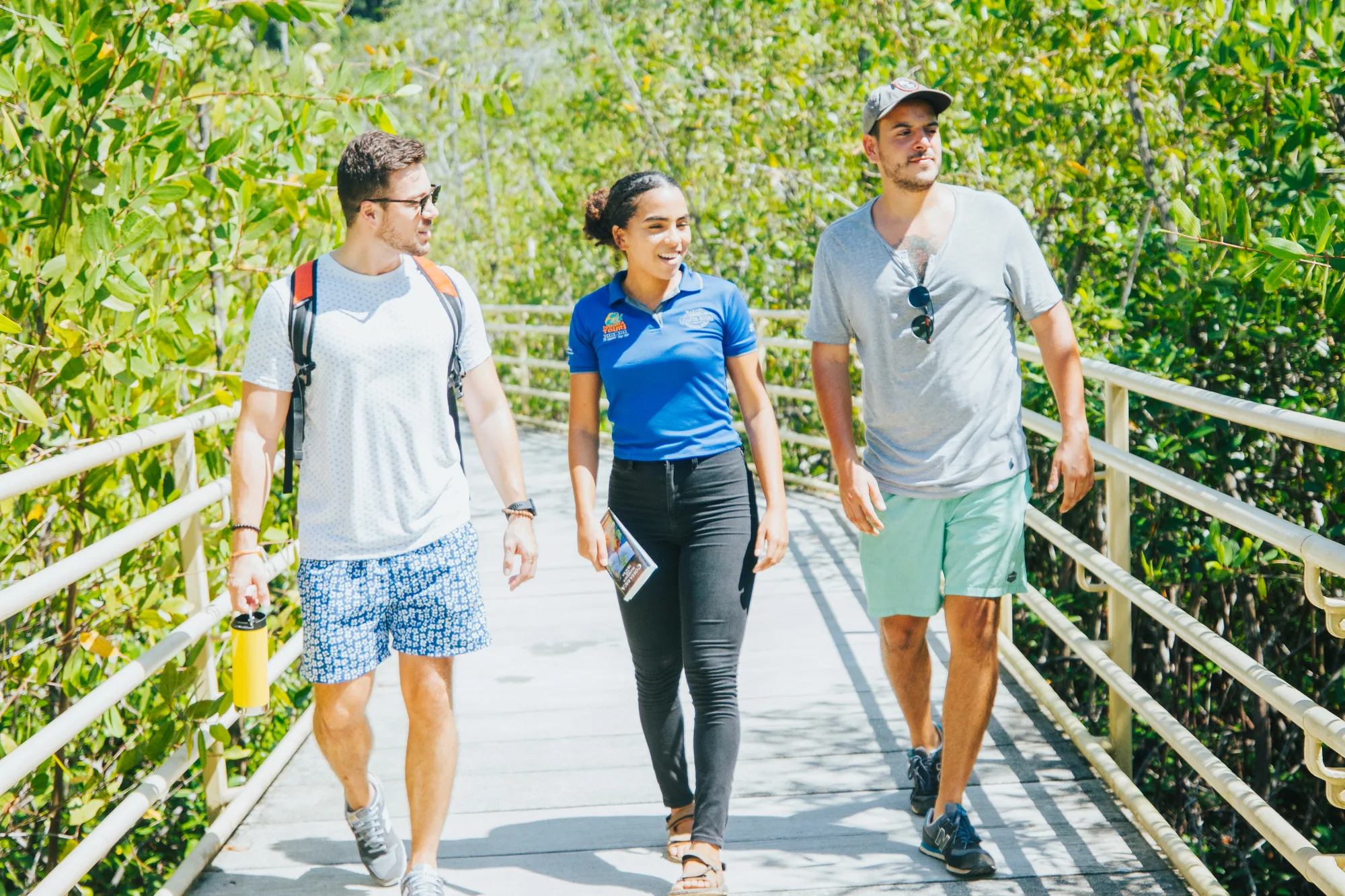 Visitors and their guide on the park boardwalk at opening