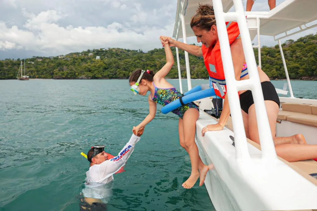 The boat stops. You get in.